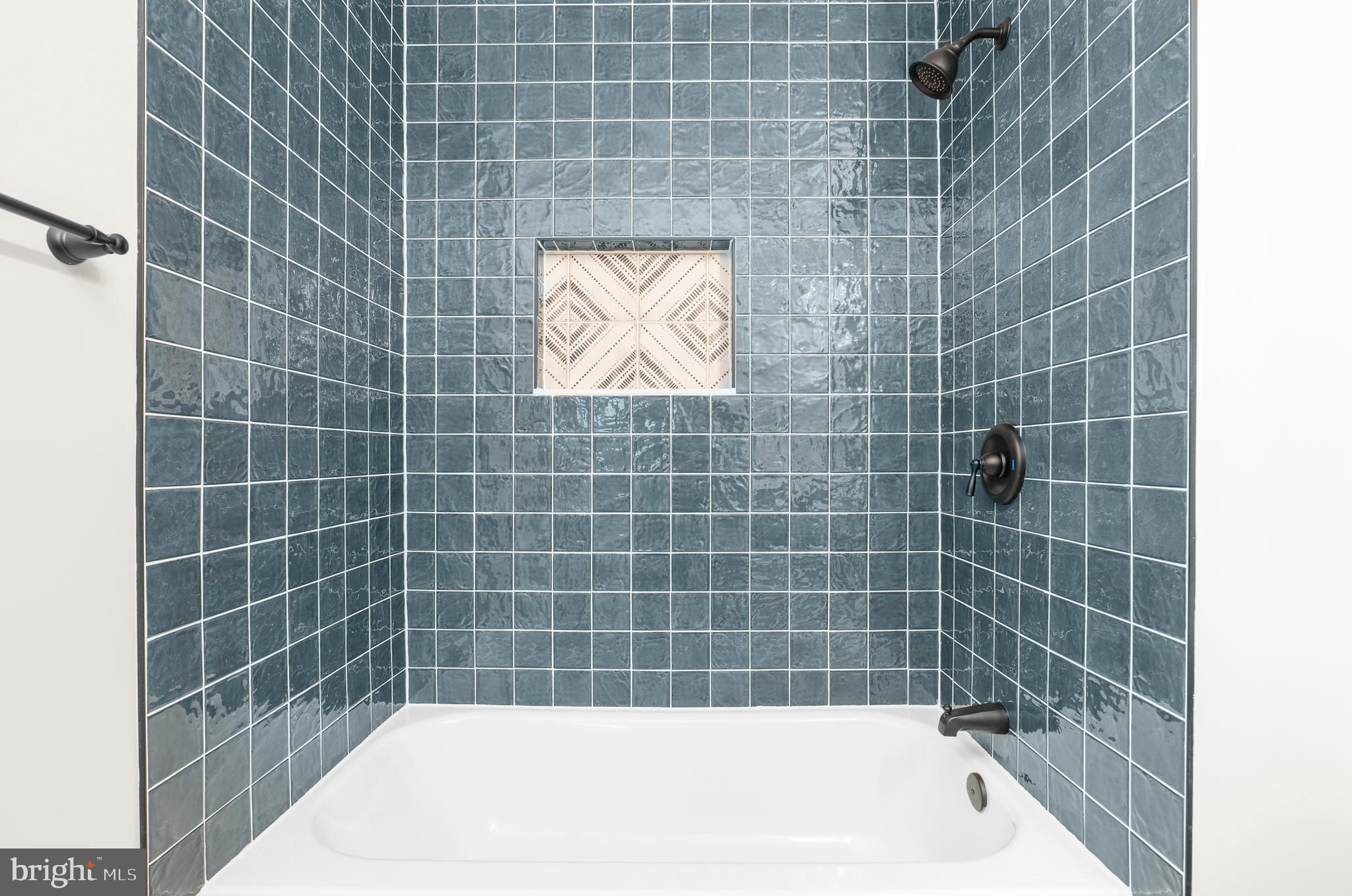 5485 Solomons Island Road Lothian, MD 20711 - Photo 55 of 64 a bathroom with a bathtub