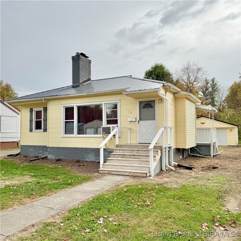 569 Broadway Street Austin, IN 47102 - Photo 2 of 22 Front