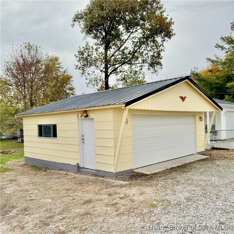 569 Broadway Street Austin, IN 47102 - Photo 7 of 22 Garage