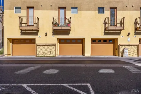 a view of a building with a street