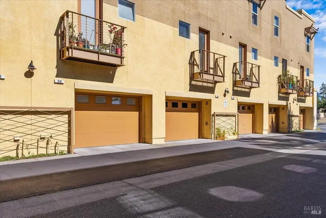 a view of a house with a street