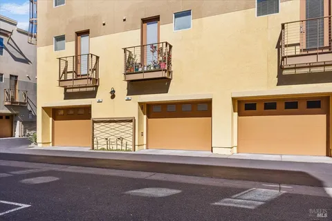 an aerial view of a city with lots of residential buildings