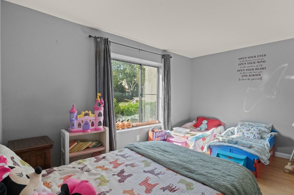481 Buck Island Road, Unit 11F Yarmouth, MA 02673 - Photo 19 of 28 a bedroom with a bed and a window