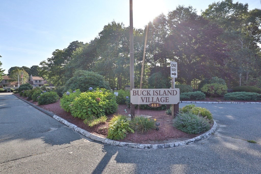 481 Buck Island Road, Unit 11F Yarmouth, MA 02673 - Photo 3 of 28 a sign that is sitting in front of a house