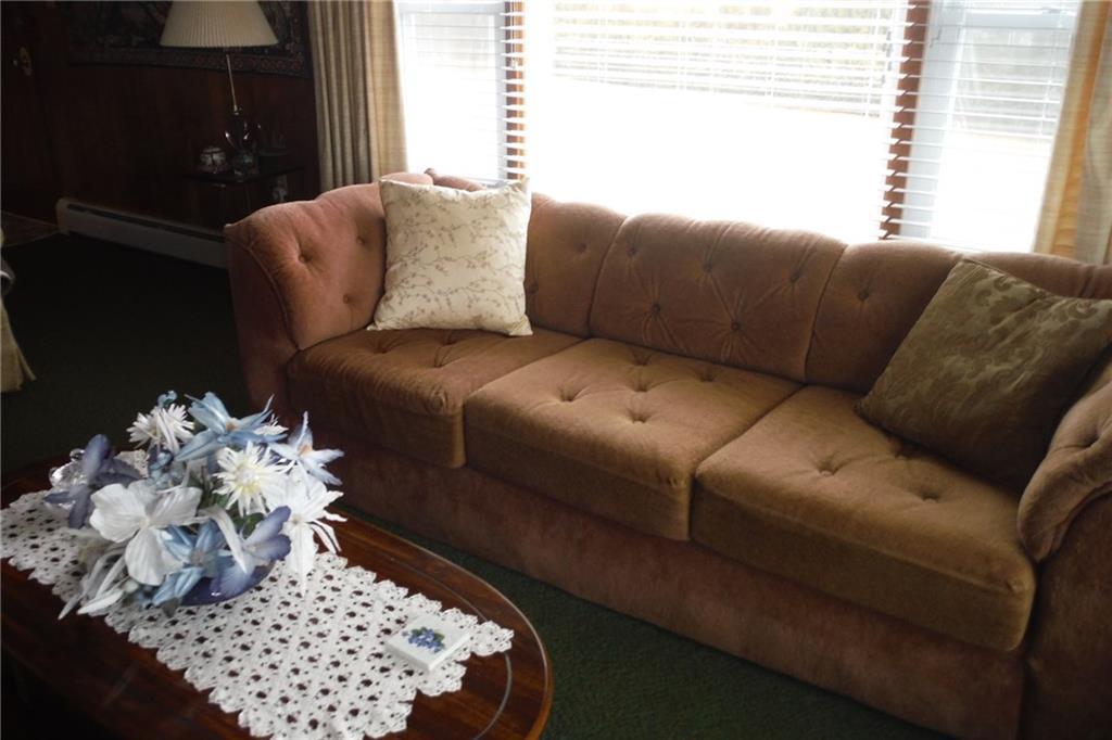 149 Russell Hill Road Bucksport, ME 04416 - Photo 5 of 22 Living room looks out over view.