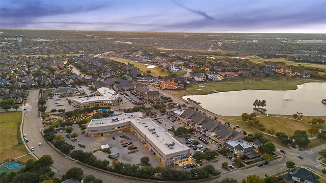 an aerial view of a house with a outdoor space