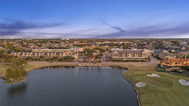 an aerial view of city and lake view