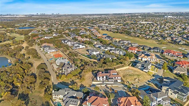 an aerial view of a city with lots of residential buildings