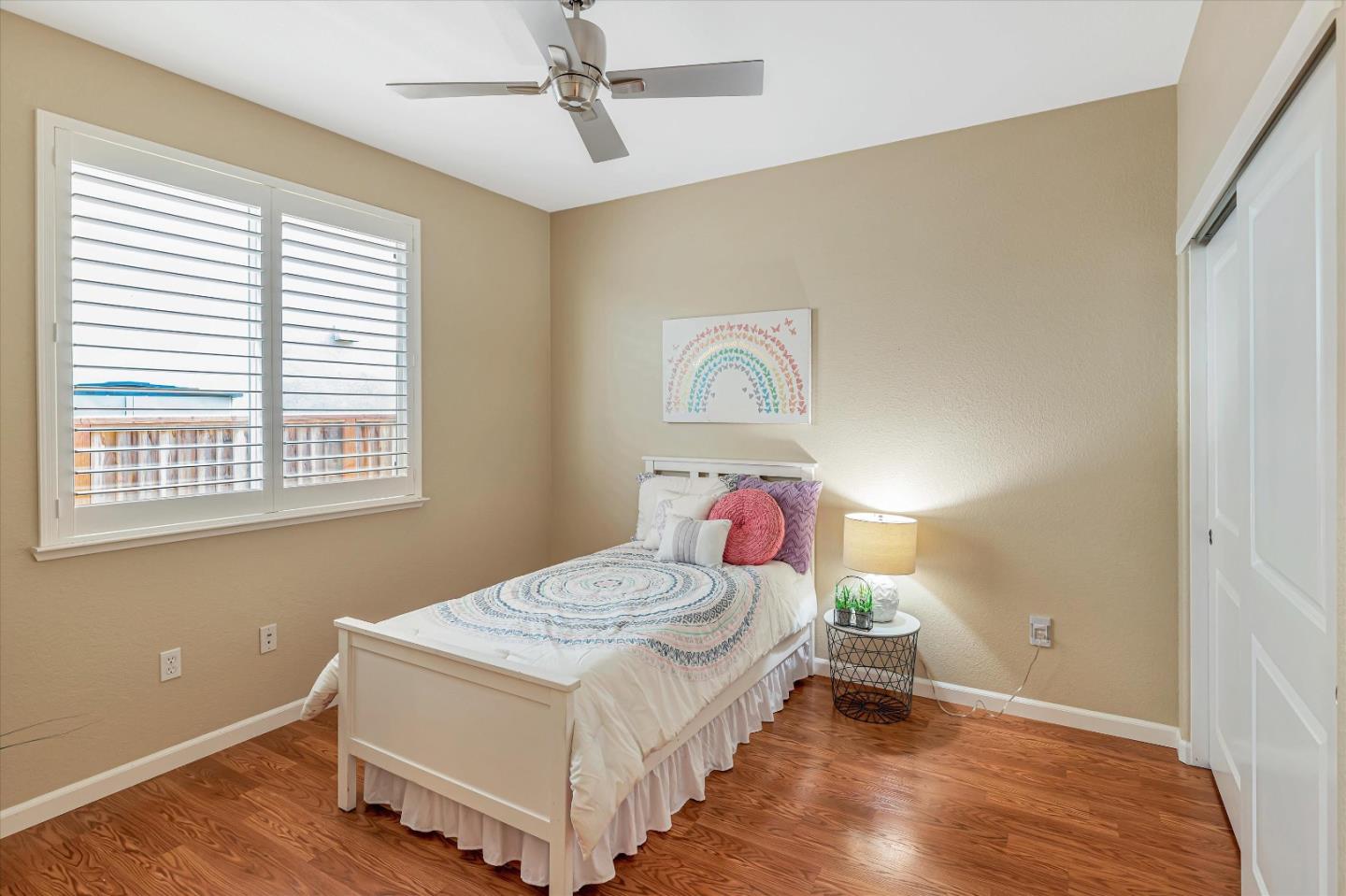 9545 Grande Drive Gilroy, CA 95020 - Photo 14 of 28 a bedroom with a bed and a window