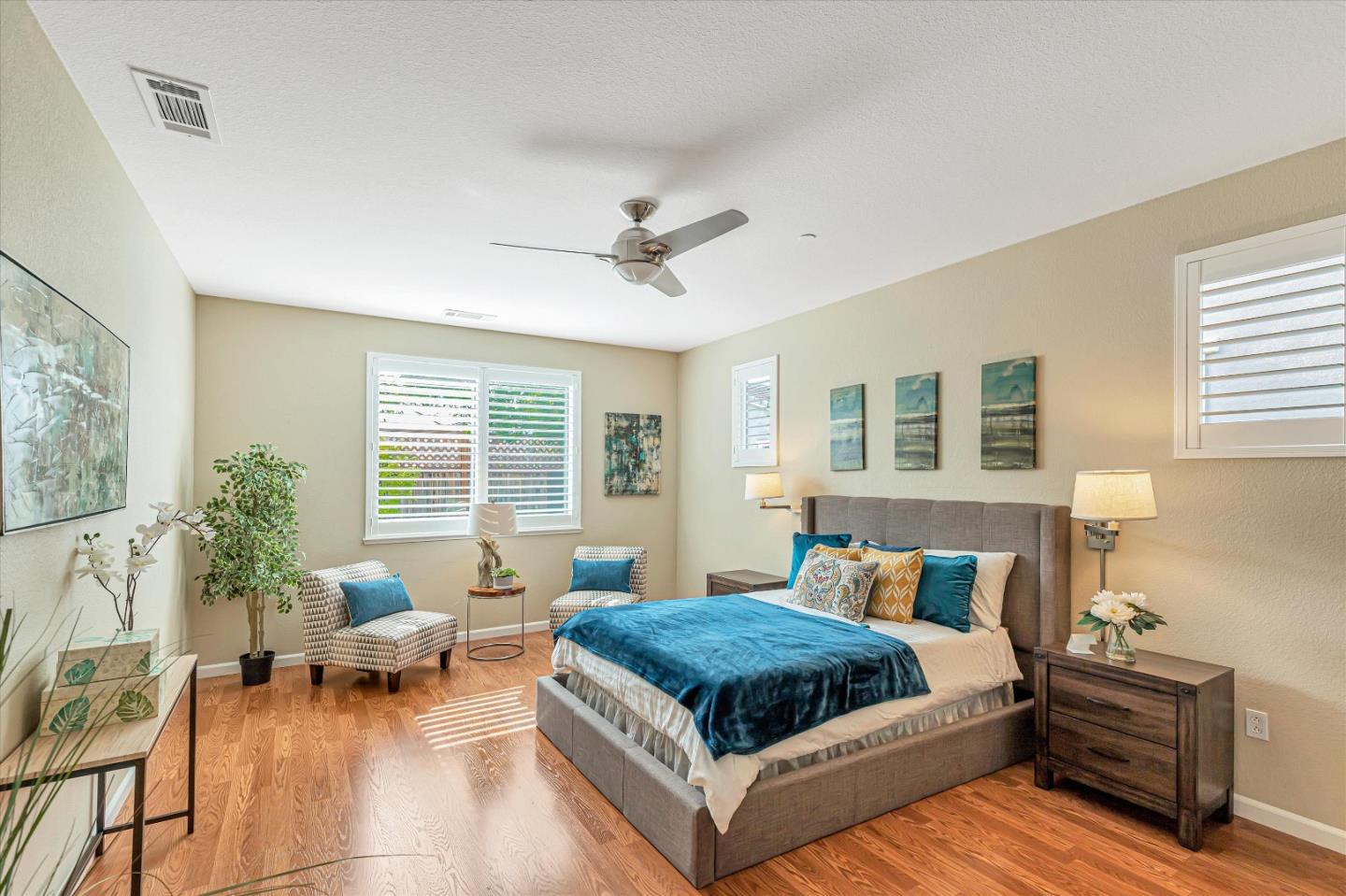 9545 Grande Drive Gilroy, CA 95020 - Photo 16 of 28 a bedroom with a large bed and a large window