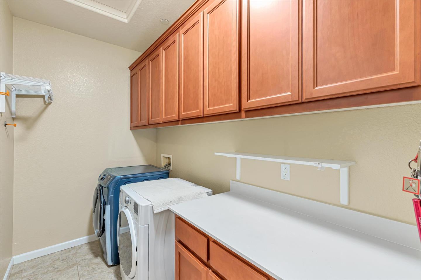 9545 Grande Drive Gilroy, CA 95020 - Photo 21 of 28 a utility room with dryer and washer