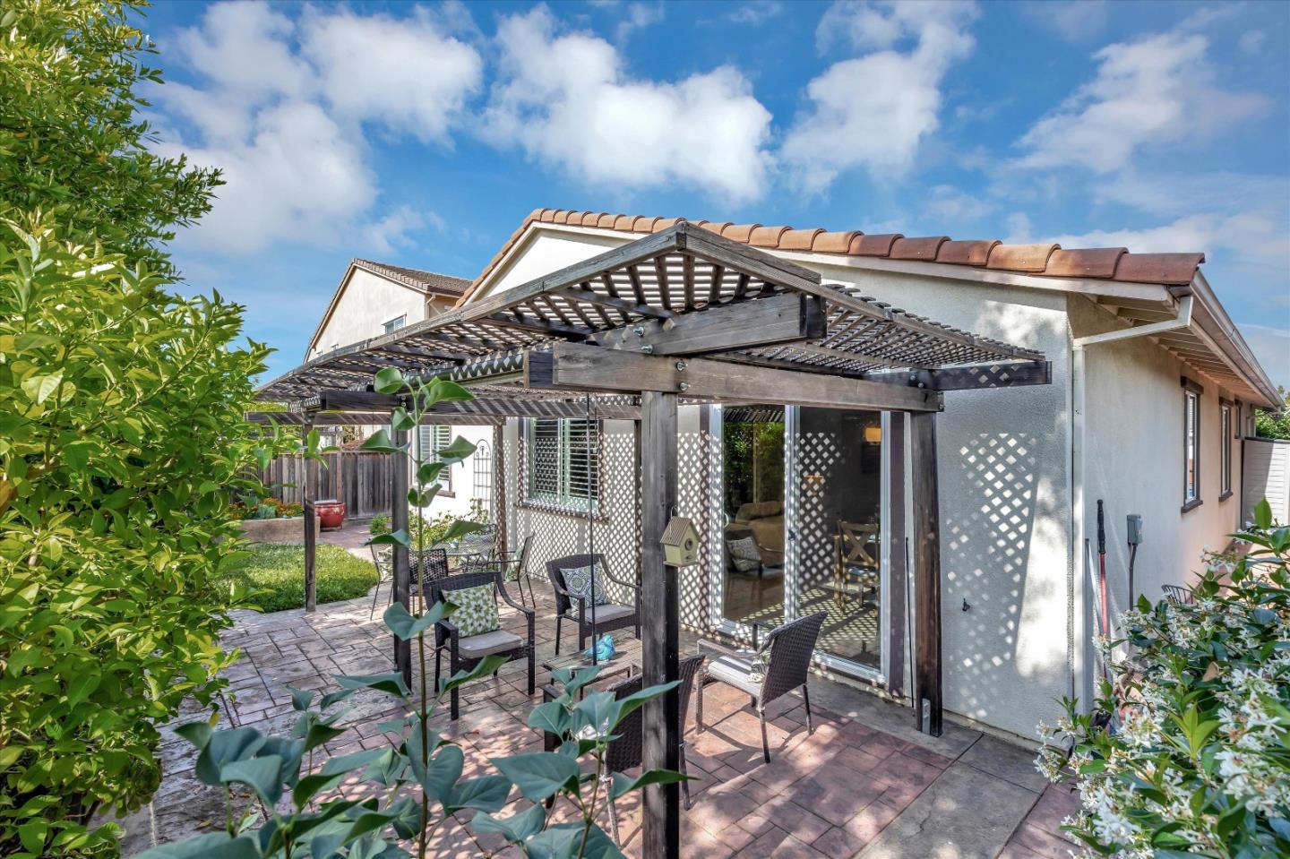 9545 Grande Drive Gilroy, CA 95020 - Photo 23 of 28 a front view of a house with garden