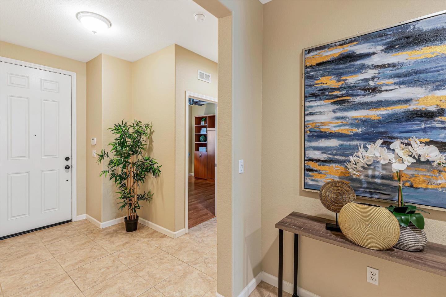 9545 Grande Drive Gilroy, CA 95020 - Photo 3 of 28 a living room with furniture and a potted plant
