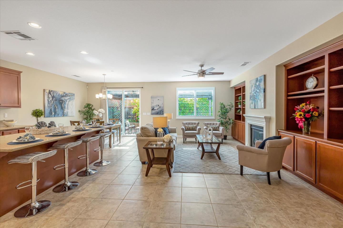 9545 Grande Drive Gilroy, CA 95020 - Photo 6 of 28 a large open kitchen with a large window and stainless steel appliances