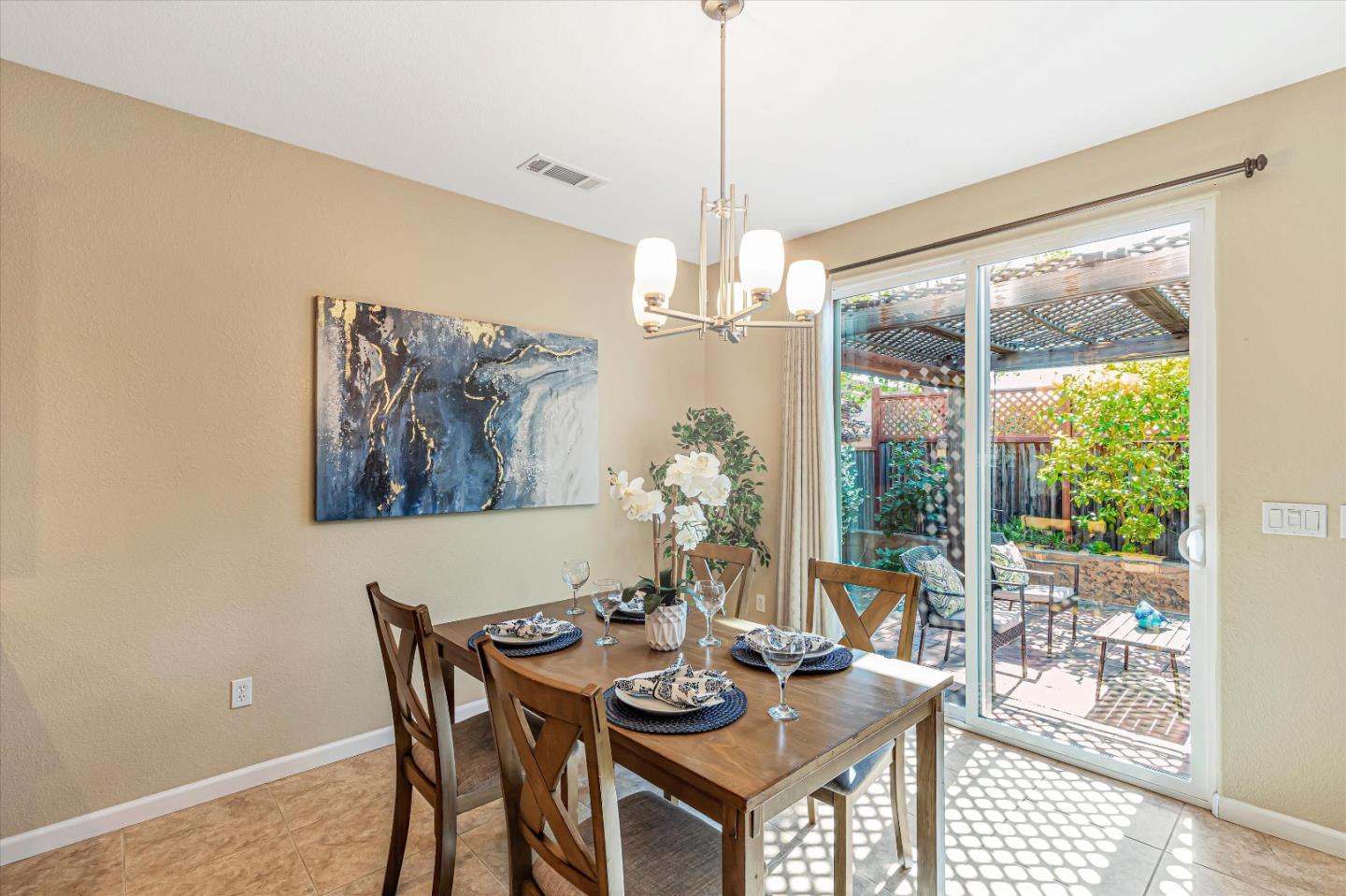 9545 Grande Drive Gilroy, CA 95020 - Photo 10 of 28 a view of a dining room with furniture window and outside view