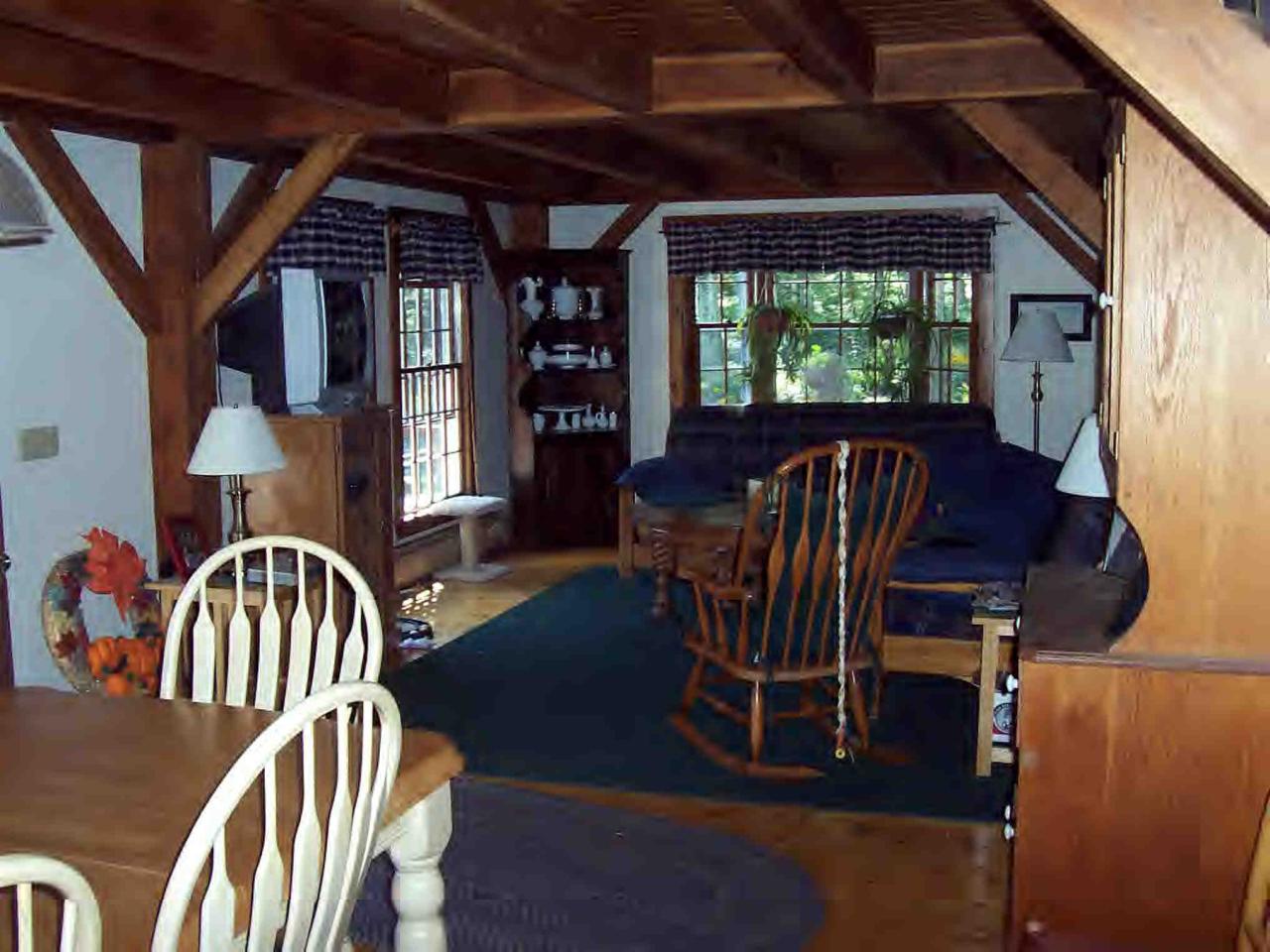 112 Bailey Road Lanesborough, MA 01237 - Photo 3 of 6 a view of a livingroom with furniture and porch