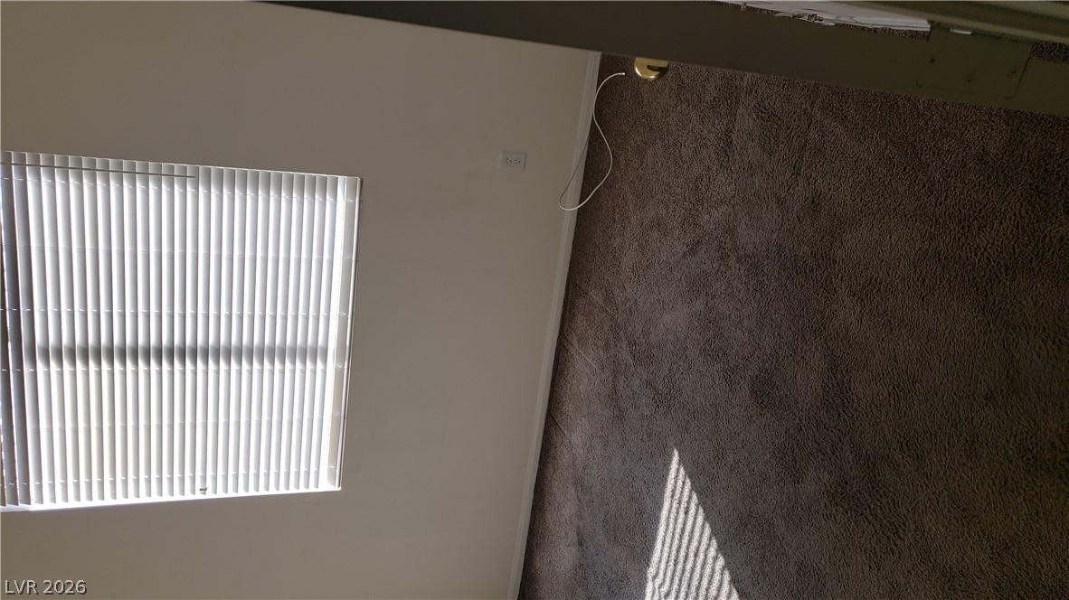 9112 Manalang Road Las Vegas, NV 89123 - Photo 19 of 50 Sunlight streams into this private space, illuminating the soft, plush carpet.