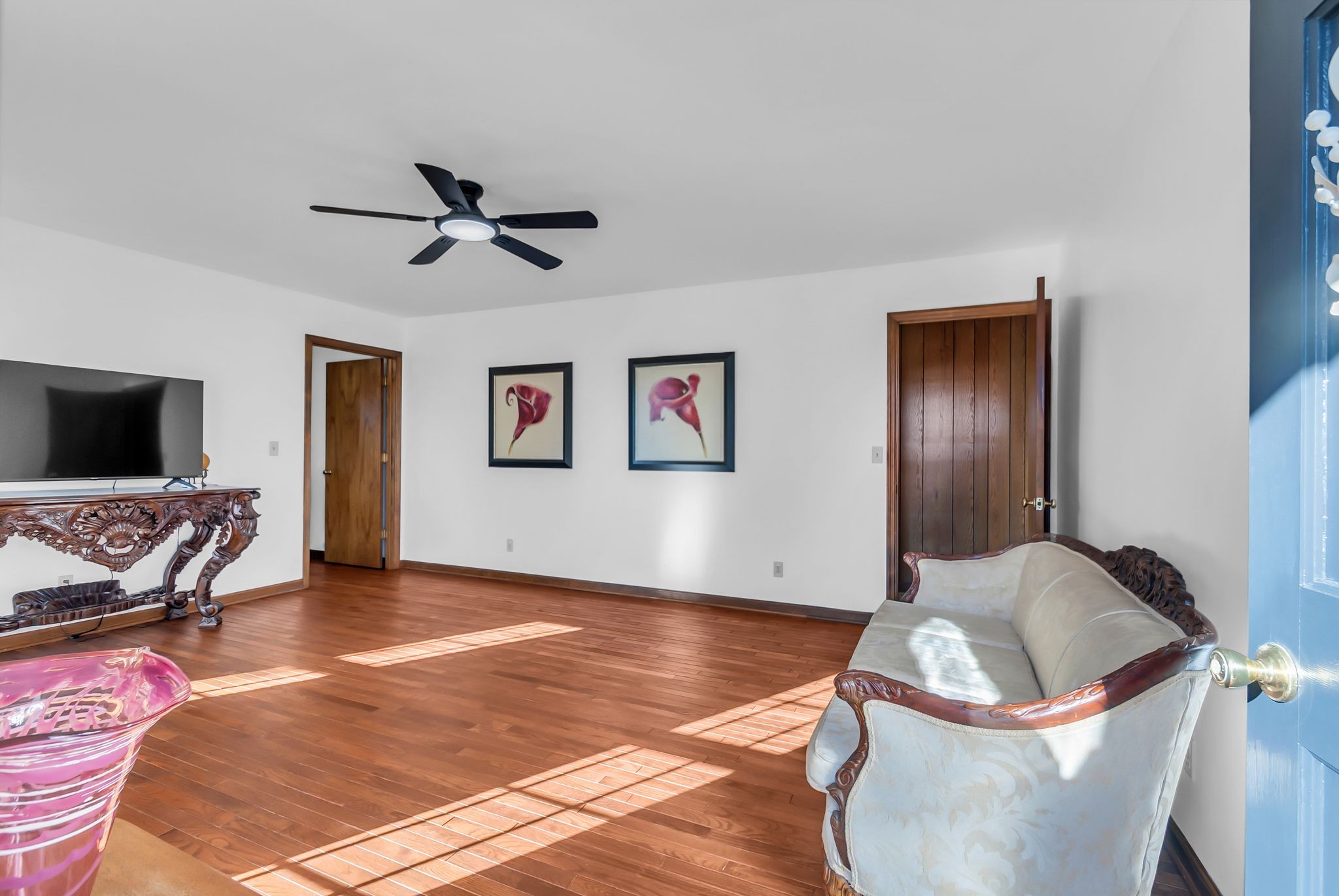 104 Glendale Road Loretto, TN 38469 - Photo 19 of 46 a living room with furniture and a flat screen tv