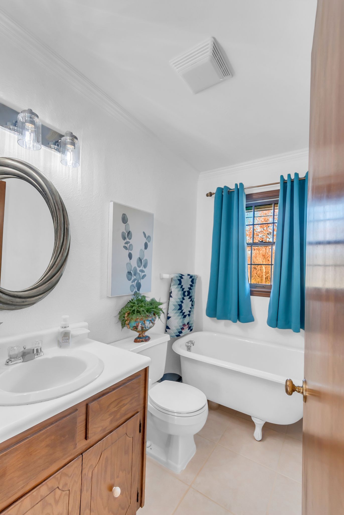104 Glendale Road Loretto, TN 38469 - Photo 22 of 45 a bathroom with a sink a toilet and a mirror