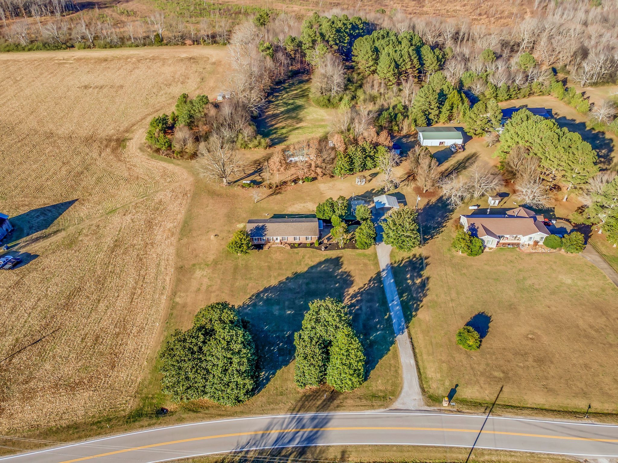 104 Glendale Road Loretto, TN 38469 - Photo 44 of 46 an aerial view of lake and residential houses with outdoor space