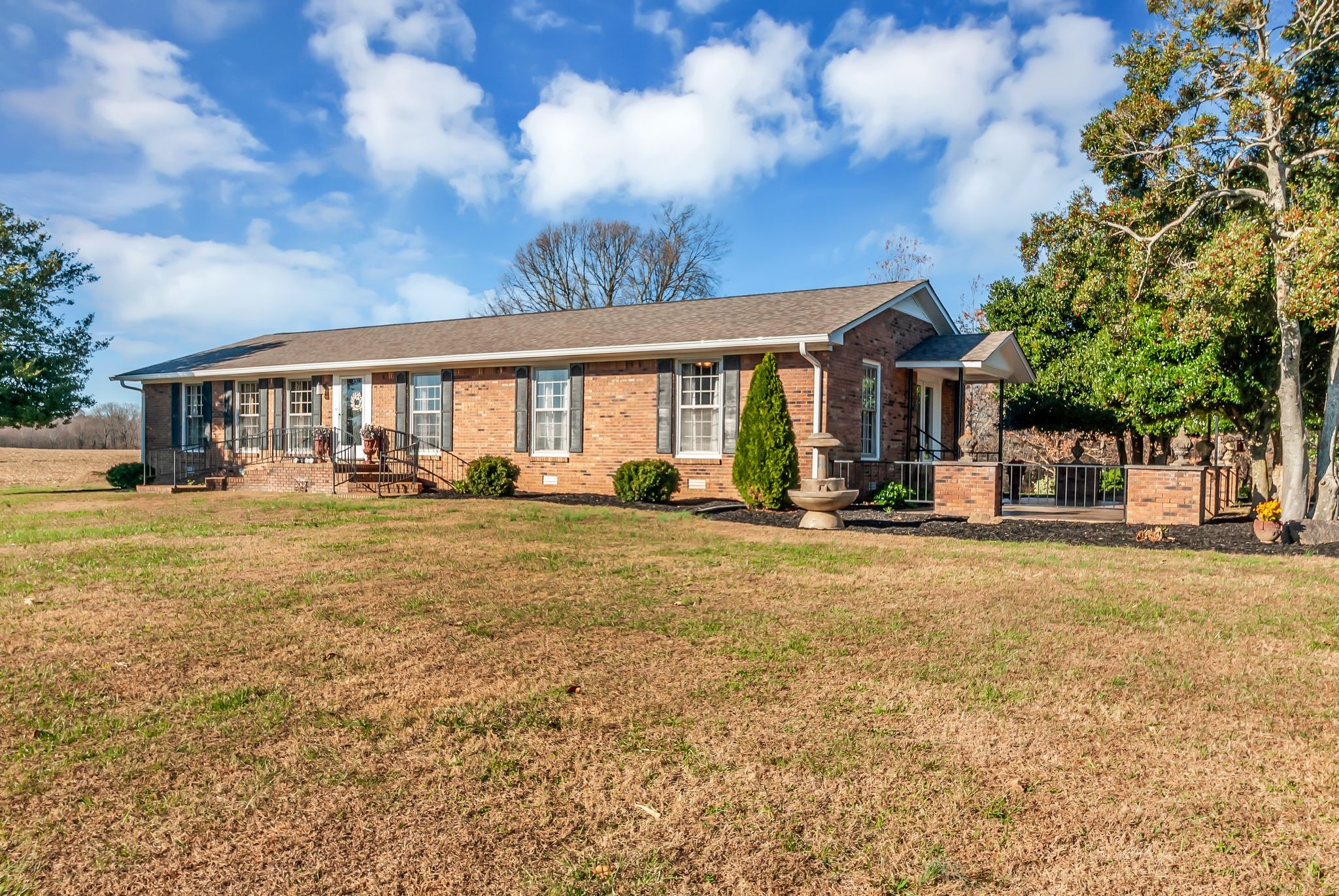 104 Glendale Road Loretto, TN 38469 - Photo 8 of 46 a front view of a house with a yard