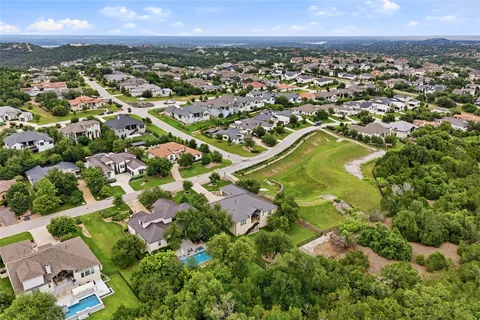 an aerial view of residential house with outdoor space