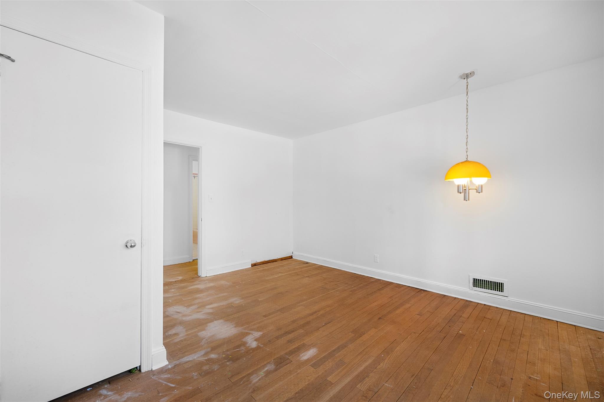 66 Deepdale Drive Great Neck, NY 11021 - Photo 30 of 48 a view of a room with wooden floor
