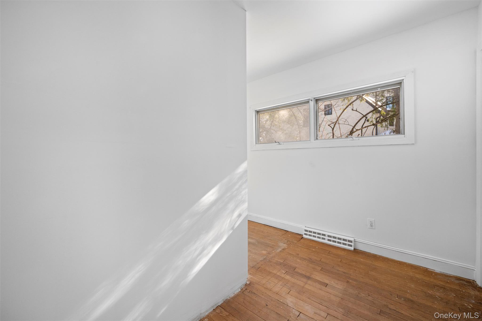 66 Deepdale Drive Great Neck, NY 11021 - Photo 32 of 48 a view of an empty room