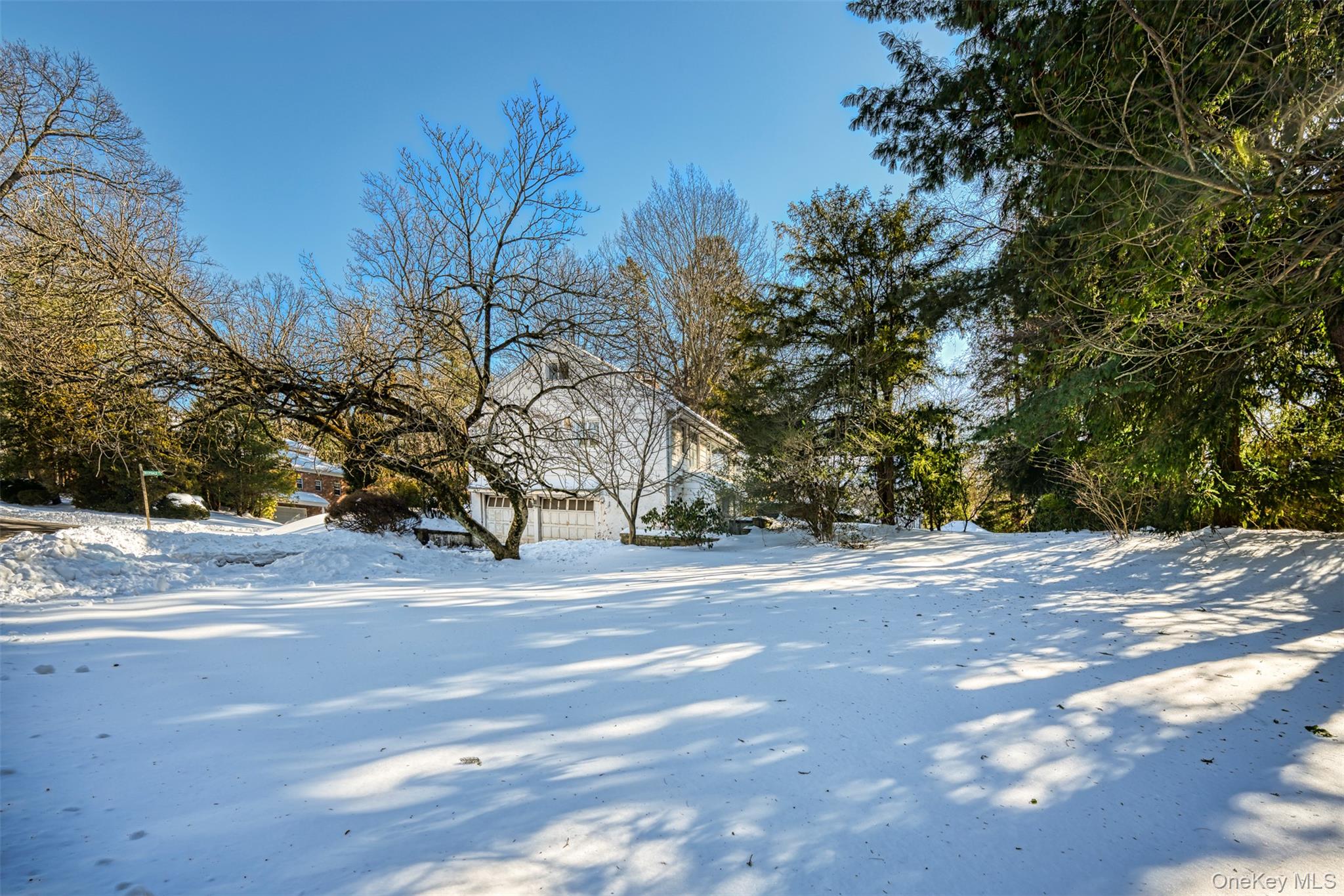 66 Deepdale Drive Great Neck, NY 11021 - Photo 38 of 48 a view of road and trees