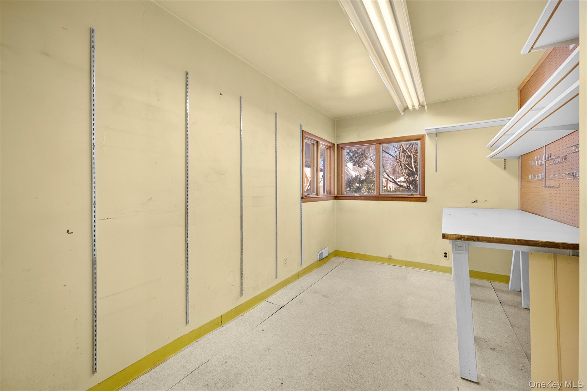 66 Deepdale Drive Great Neck, NY 11021 - Photo 42 of 48 a view of an empty room with a window