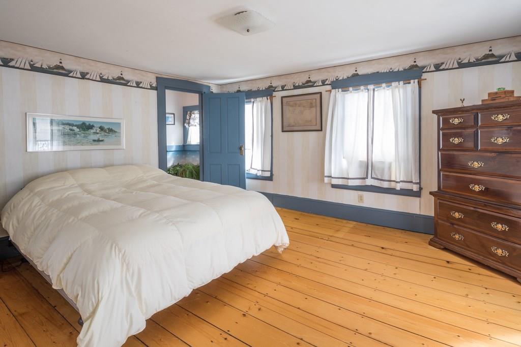 6 Pier Road Kennebunkport, ME 04046 - Photo 16 of 24 The master bedroom has pine floors,...