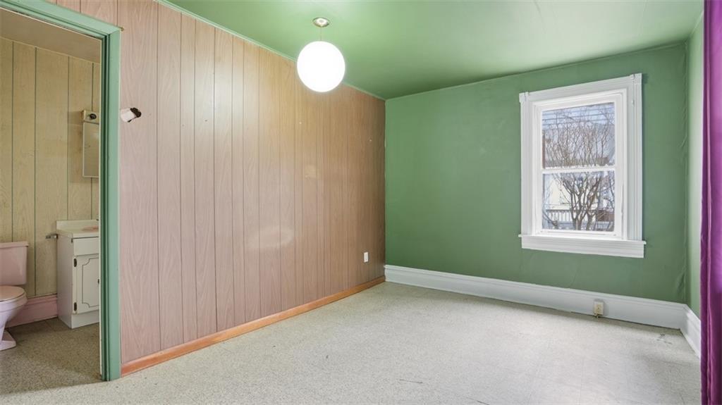 328 West New Castle Street Butler, PA 16001 - Photo 12 of 42 Den-like room off of living room could be converted into main level bedroom with ensuite bathroom.