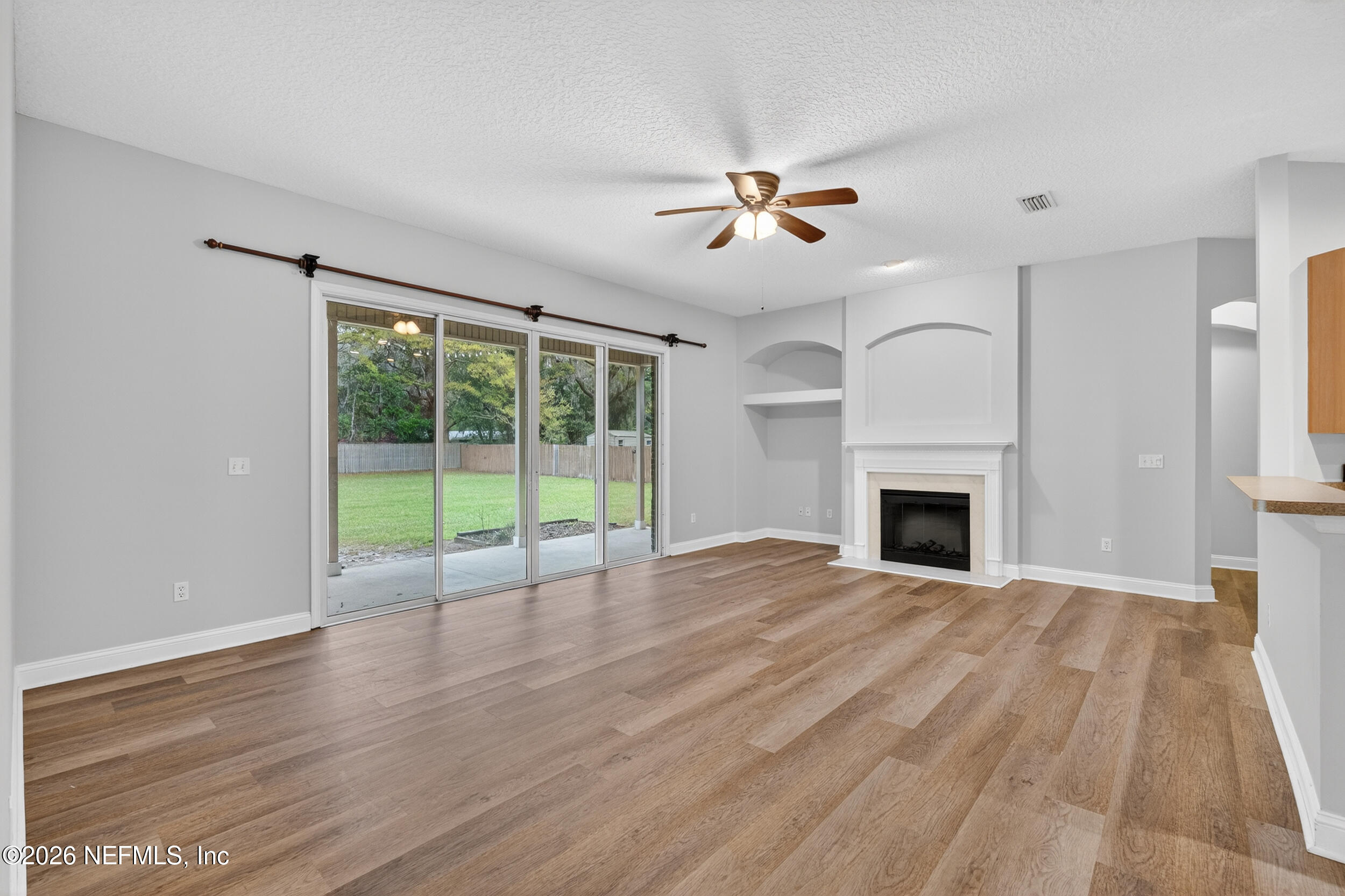97076 Arnold Ridge Drive Yulee, FL 32097 - Photo 11 of 44 Sliding Glass Doors leading to backyard