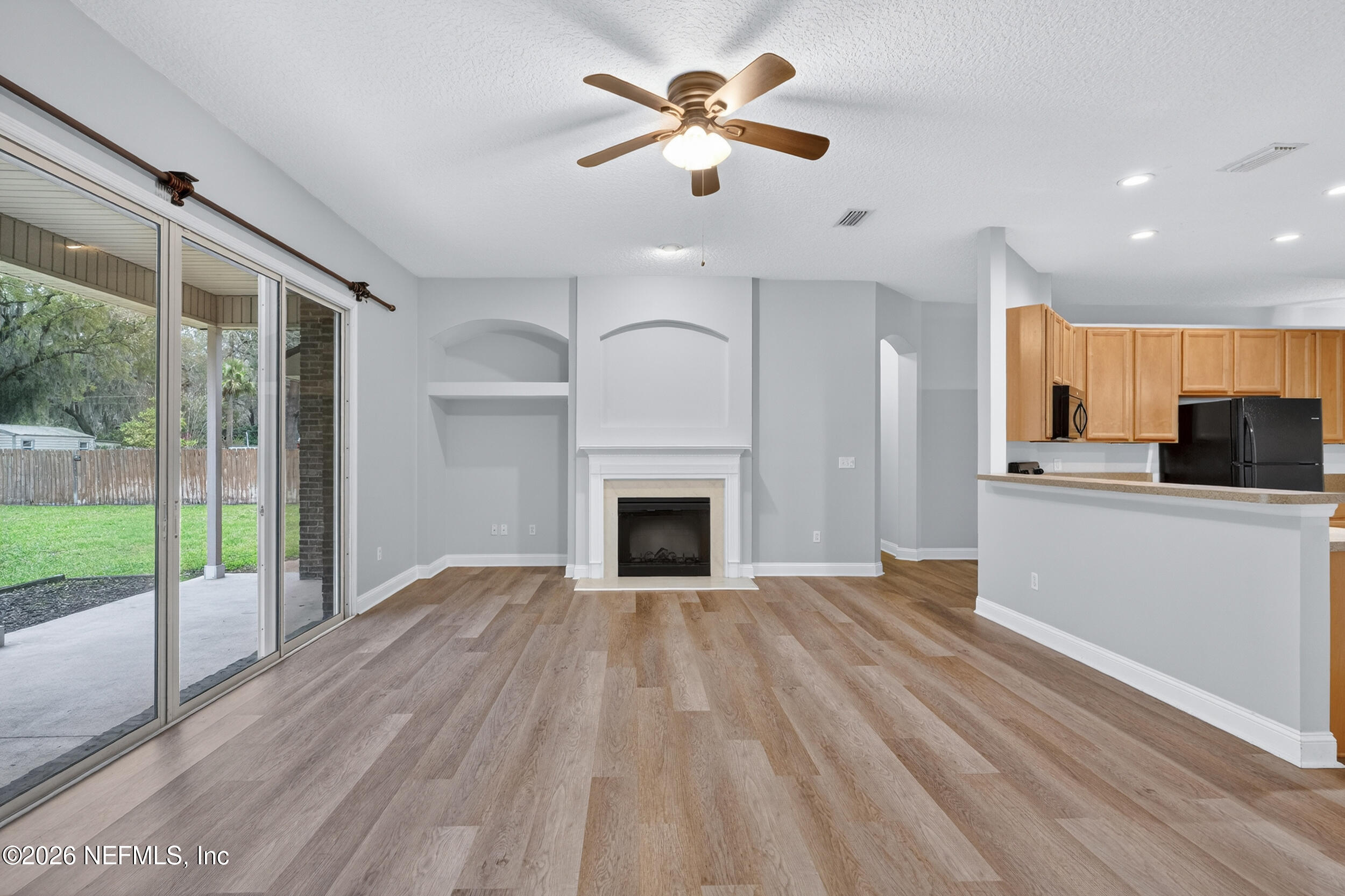 97076 Arnold Ridge Drive Yulee, FL 32097 - Photo 14 of 44 Cozy Fireplace