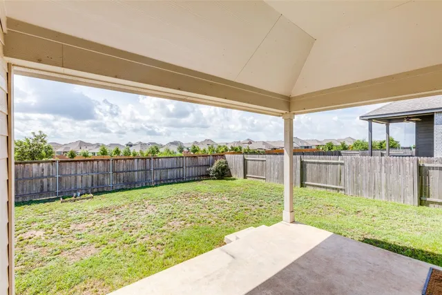 a view of a backyard with a garden