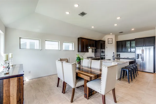 a view of a dining room with furniture