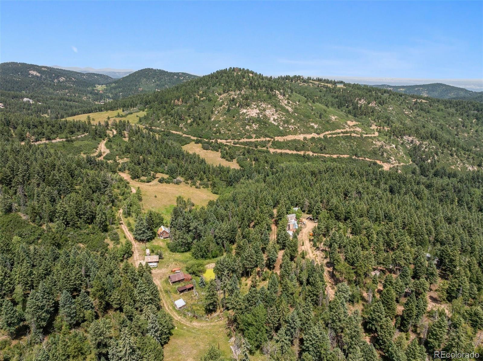 12954 South Kuehster Road Littleton, CO 80127 - Photo 34 of 43 a view of a city with mountains in the background