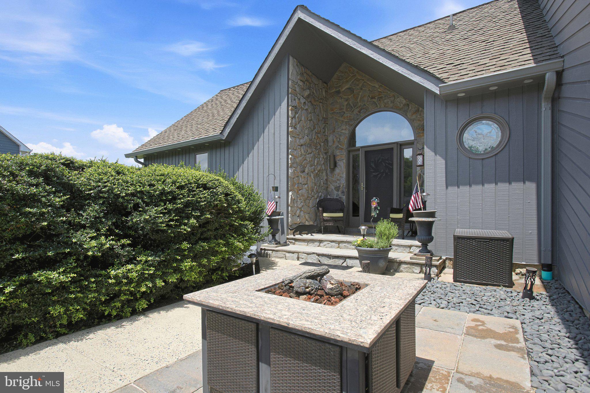 6495 Tides Road King George, VA 22485 - Photo 43 of 65 a view of house with wooden deck and living room