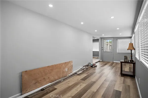 a view of room with window and stairs