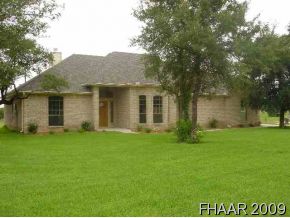 136 Spring Meadow Lane Belton, TX 76513 - Photo 1 of 1 front view of a house with a yard