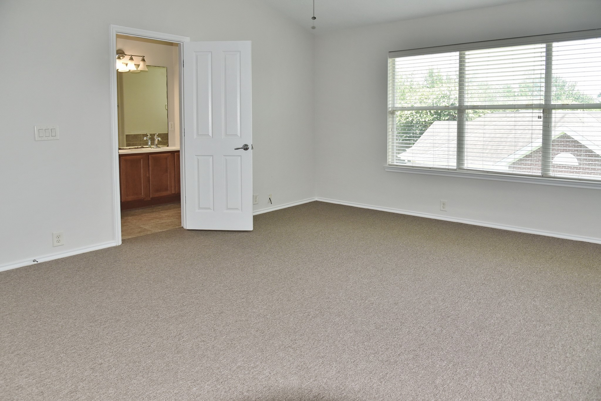13600 Breton Ridge Street, Unit 20B Houston, TX 77070 - Photo 23 of 32 an empty room with a window
