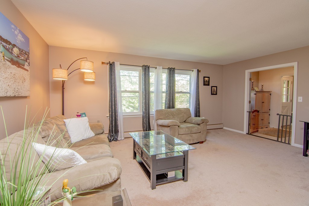 843 Blandford Road Russell, MA 01071 - Photo 12 of 27 a living room with furniture and a large window