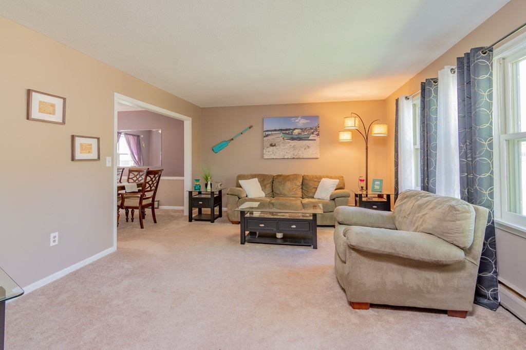 843 Blandford Road Russell, MA 01071 - Photo 13 of 27 a living room with furniture and a large window