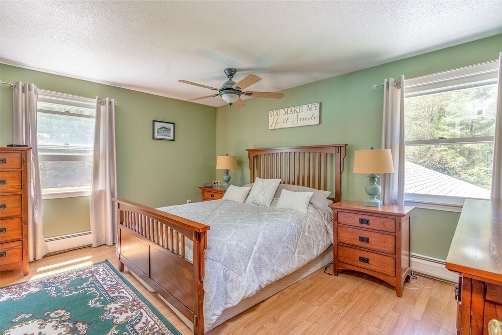 843 Blandford Road Russell, MA 01071 - Photo 15 of 27 a bedroom with a bed and a tv on the dresser