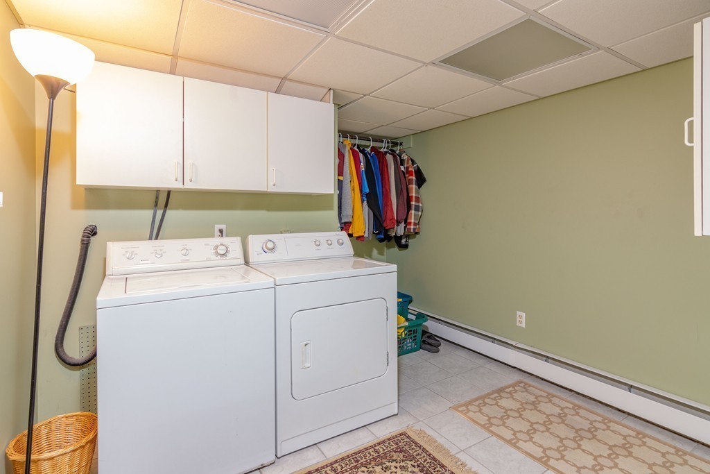 843 Blandford Road Russell, MA 01071 - Photo 23 of 27 a utility room with dryer and washer