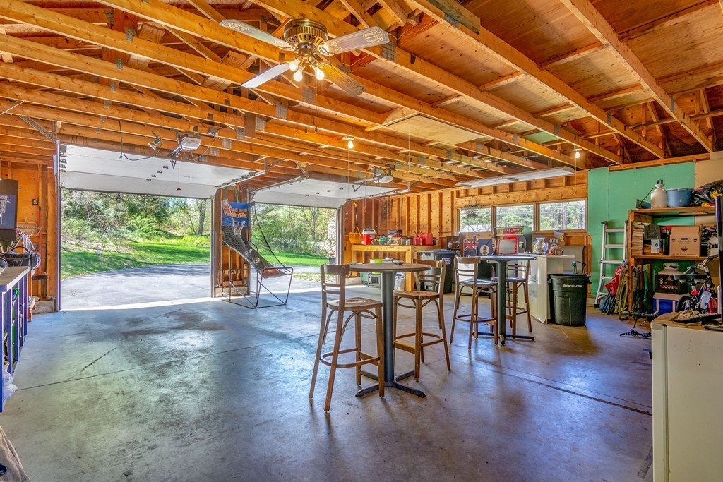 843 Blandford Road Russell, MA 01071 - Photo 25 of 27 a dining room with furniture and wooden floor