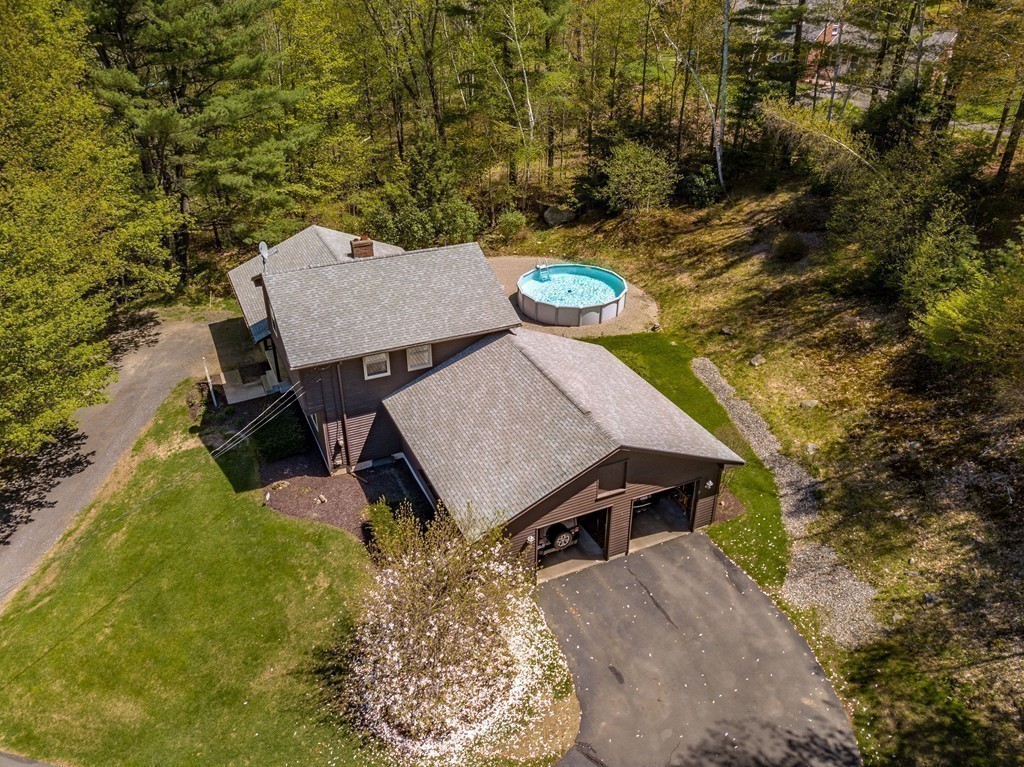 843 Blandford Road Russell, MA 01071 - Photo 26 of 27 an aerial view of a house with a yard and trees