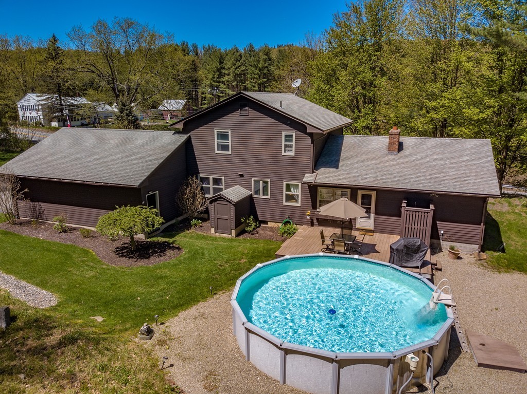 843 Blandford Road Russell, MA 01071 - Photo 3 of 27 an aerial view of a house with garden space and trees