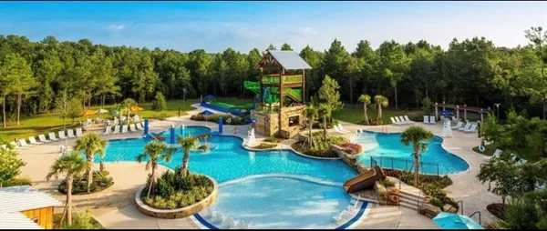 a view of yard from deck back yard