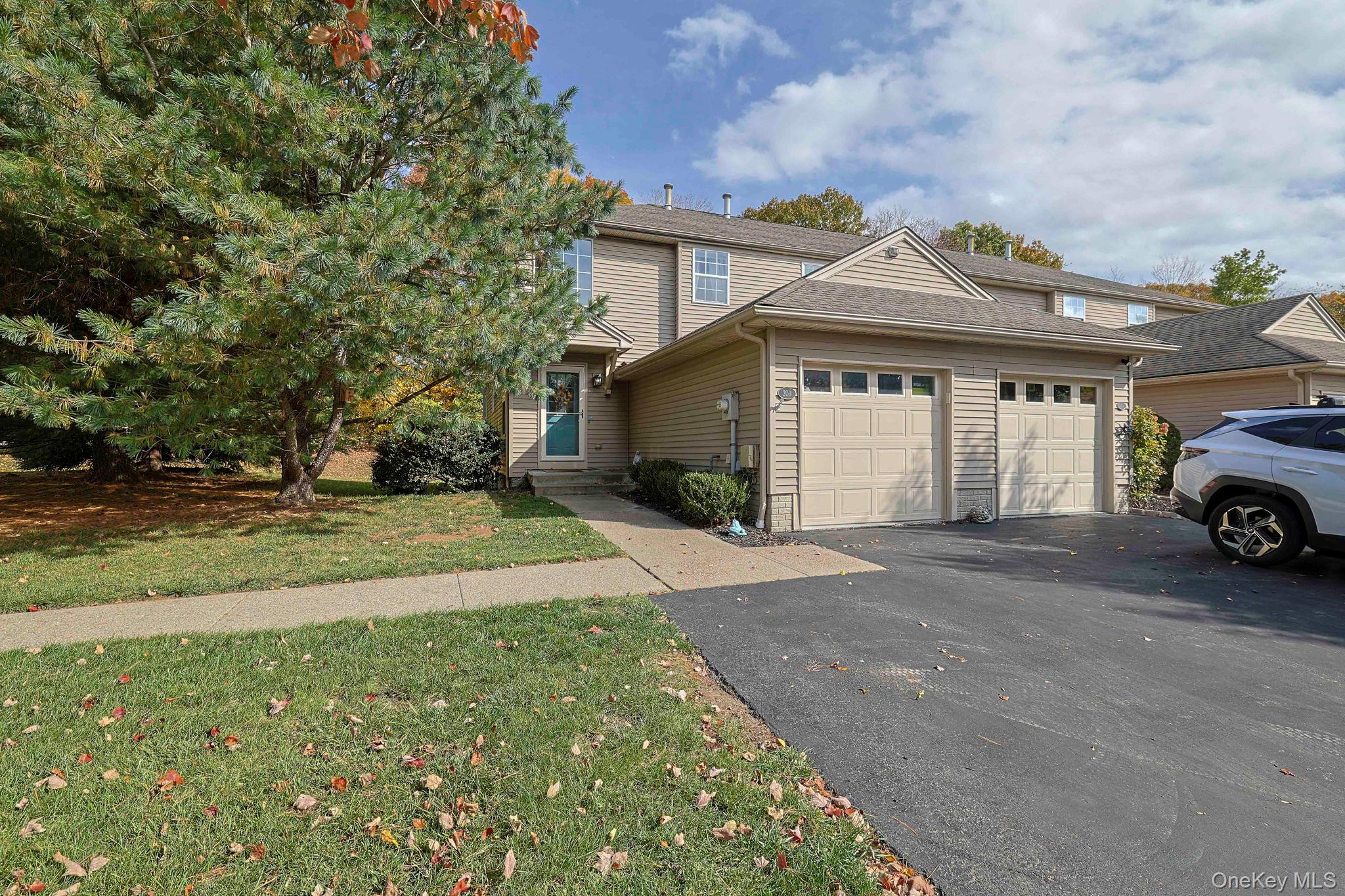 209 Crestwood Court Fishkill, NY 12524 - Photo 3 of 23 a view of a car parked in front of a house